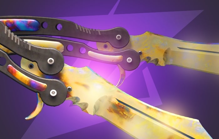Gold Gem Butterfly Knife (#75, #599) CS2 skin with a polished golden gem surface, sharp blade profile, and iconic butterfly knife flipping design