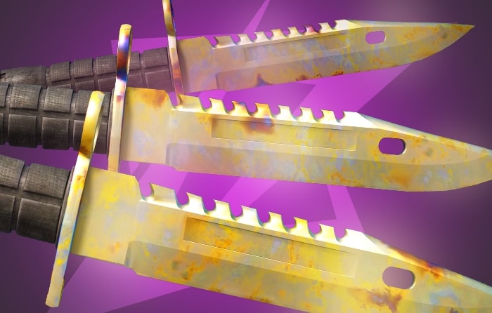 Gold Gem M9 Bayonet CS2 skin featuring top patterns #739, #787, and #471 with intense gold gem coverage, a wide tactical blade, and a distinctive serrated spine